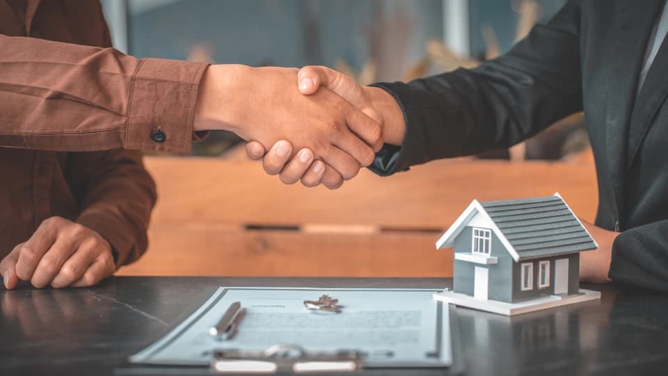 Two people shaking hands
