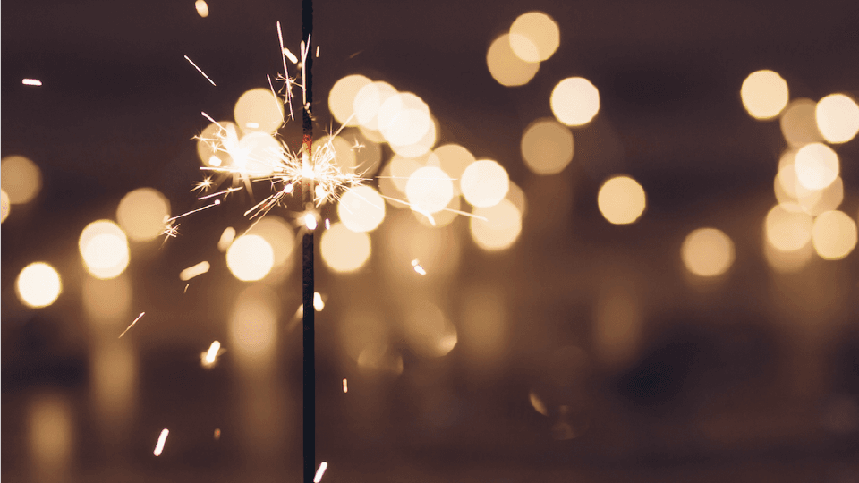 Sparklers with blurred lights