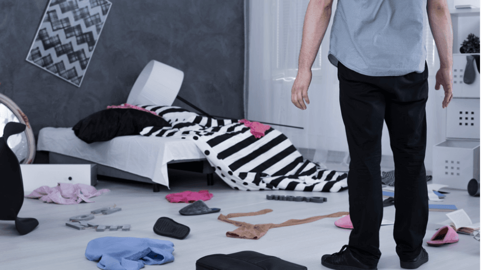 Man in a messy room