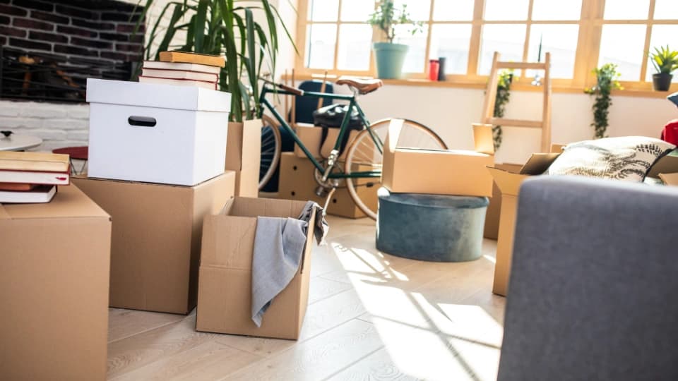 boxes on the floor of an apartment