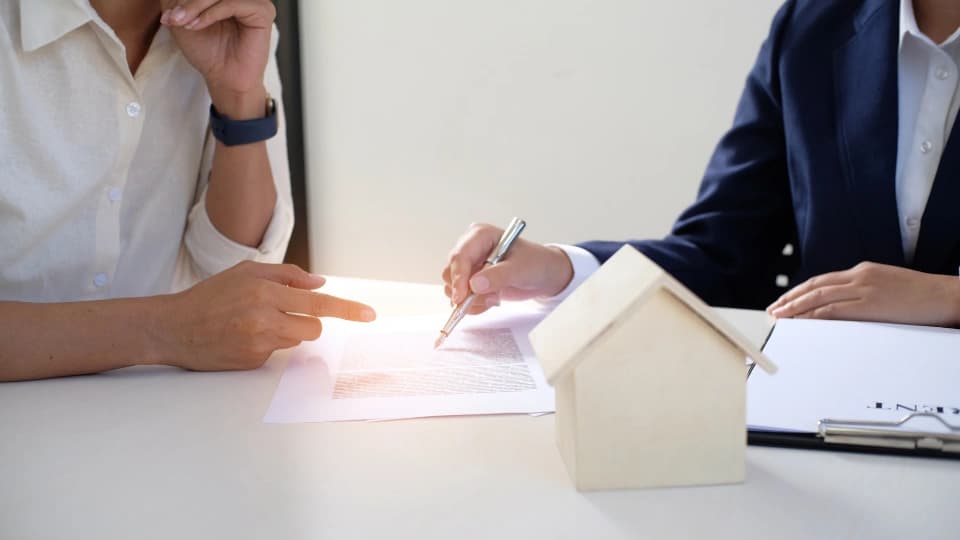 Property manager giving advice during application form document