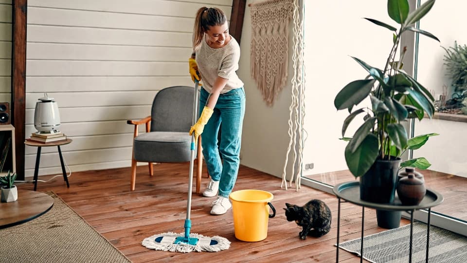 woman mopping floors