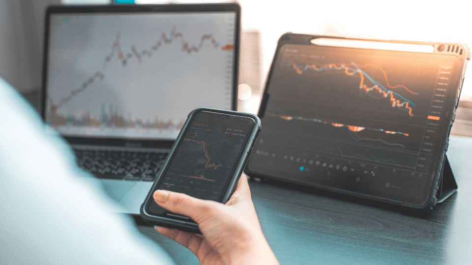 Stock graphs on three screens