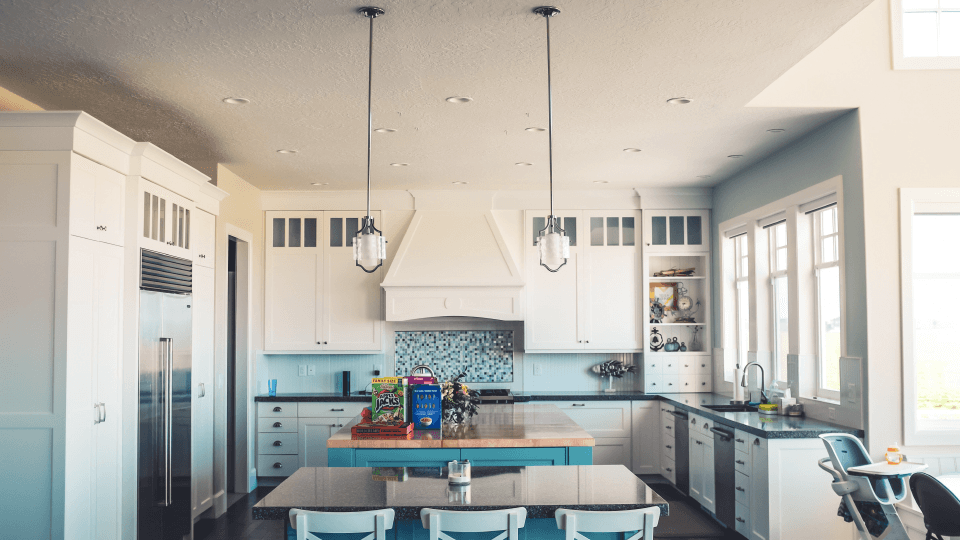 Kitchen in white and light blue colors