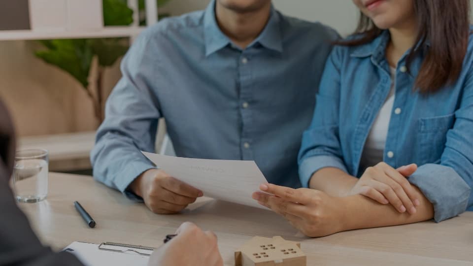 Couple looking over a document
