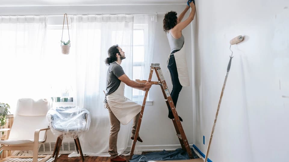 Couple doing home renovations