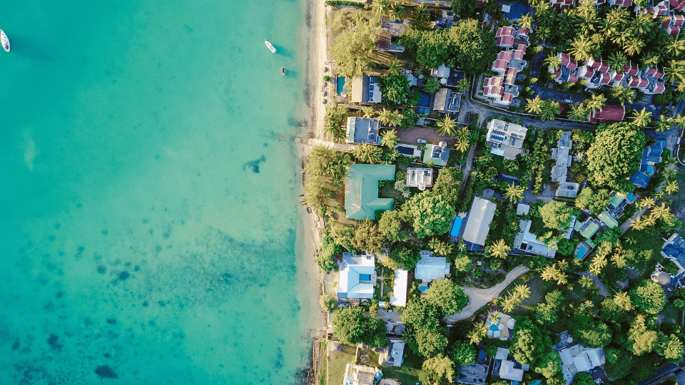 Aerial view of homes on the ocean coast
