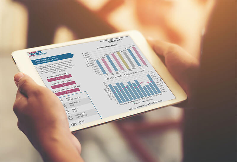 Person holding a tablet showing their free rental price analysis